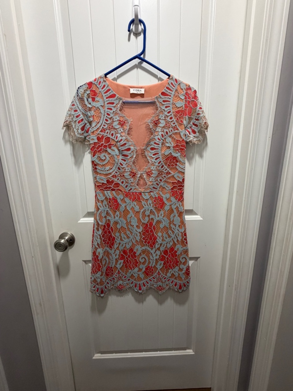 Storia Coral Lined Dress with Light Blue Lace Overlay.